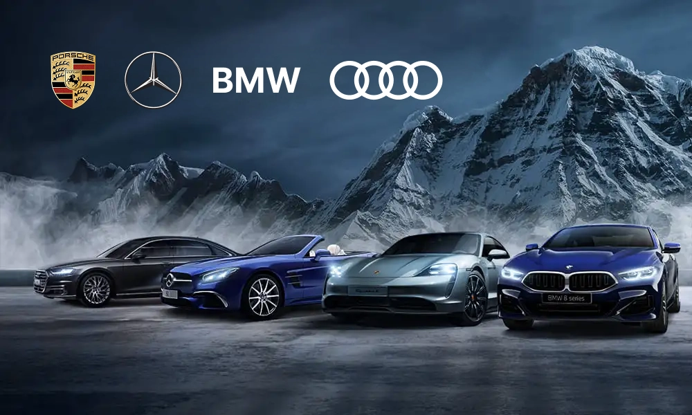 автомобили на фоне гор